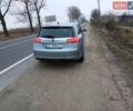 Сірий Опель Інсігнія, об'ємом двигуна 2 л та пробігом 300 тис. км за 10000 $, фото 1 на Automoto.ua