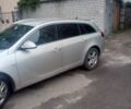 Сірий Опель Інсігнія, об'ємом двигуна 2 л та пробігом 240 тис. км за 7700 $, фото 1 на Automoto.ua