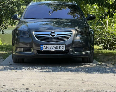 Серый Опель Инсигния, объемом двигателя 2 л и пробегом 247 тыс. км за 10000 $, фото 4 на Automoto.ua
