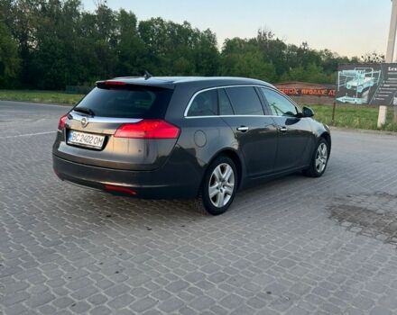 Сірий Опель Інсігнія, об'ємом двигуна 1.96 л та пробігом 299 тис. км за 7600 $, фото 2 на Automoto.ua