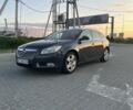 Серый Опель Инсигния, объемом двигателя 2 л и пробегом 299 тыс. км за 7700 $, фото 1 на Automoto.ua