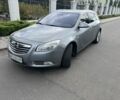 Серый Опель Инсигния, объемом двигателя 2 л и пробегом 233 тыс. км за 8572 $, фото 1 на Automoto.ua