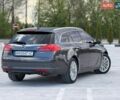 Серый Опель Инсигния, объемом двигателя 2 л и пробегом 303 тыс. км за 7700 $, фото 3 на Automoto.ua