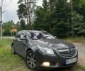 Серый Опель Инсигния, объемом двигателя 1.96 л и пробегом 256 тыс. км за 7700 $, фото 1 на Automoto.ua