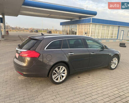 Серый Опель Инсигния, объемом двигателя 2 л и пробегом 213 тыс. км за 8950 $, фото 111 на Automoto.ua