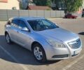 Серый Опель Инсигния, объемом двигателя 2 л и пробегом 240 тыс. км за 7499 $, фото 2 на Automoto.ua