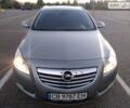 Серый Опель Инсигния, объемом двигателя 1.96 л и пробегом 370 тыс. км за 8500 $, фото 1 на Automoto.ua