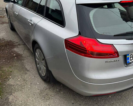 Серый Опель Инсигния, объемом двигателя 1.96 л и пробегом 234 тыс. км за 7700 $, фото 2 на Automoto.ua