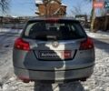 Сірий Опель Інсігнія, об'ємом двигуна 2 л та пробігом 303 тис. км за 5990 $, фото 7 на Automoto.ua