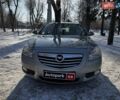Серый Опель Инсигния, объемом двигателя 2 л и пробегом 303 тыс. км за 6440 $, фото 1 на Automoto.ua