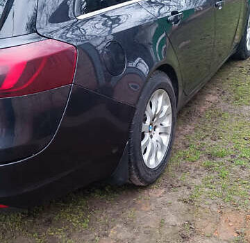 Серый Опель Инсигния, объемом двигателя 2 л и пробегом 235 тыс. км за 12200 $, фото 2 на Automoto.ua