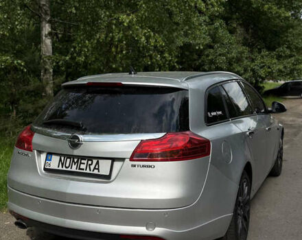 Серый Опель Инсигния, объемом двигателя 1.96 л и пробегом 233 тыс. км за 9500 $, фото 1 на Automoto.ua