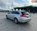 Серый Опель Инсигния, объемом двигателя 2 л и пробегом 255 тыс. км за 8100 $, фото 5 на Automoto.ua