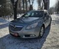 Серый Опель Инсигния, объемом двигателя 2 л и пробегом 303 тыс. км за 6440 $, фото 1 на Automoto.ua