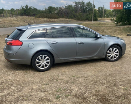 Серый Опель Инсигния, объемом двигателя 2 л и пробегом 338 тыс. км за 8100 $, фото 3 на Automoto.ua