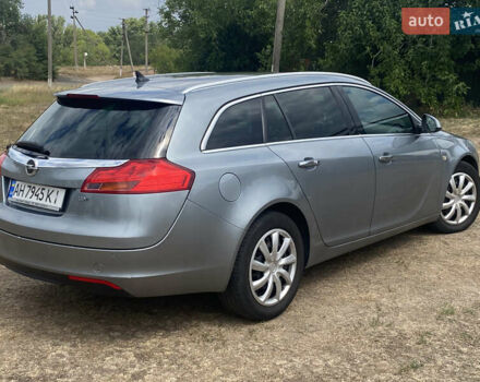 Серый Опель Инсигния, объемом двигателя 2 л и пробегом 338 тыс. км за 8100 $, фото 4 на Automoto.ua