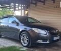 Серый Опель Инсигния, объемом двигателя 1.96 л и пробегом 188 тыс. км за 8000 $, фото 4 на Automoto.ua