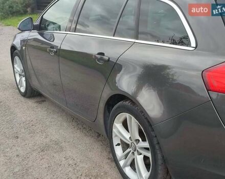 Серый Опель Инсигния, объемом двигателя 1.96 л и пробегом 214 тыс. км за 9200 $, фото 1 на Automoto.ua