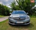Сірий Опель Інсігнія, об'ємом двигуна 1.96 л та пробігом 369 тис. км за 7299 $, фото 1 на Automoto.ua