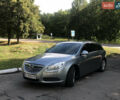 Серый Опель Инсигния, объемом двигателя 2 л и пробегом 174 тыс. км за 7800 $, фото 1 на Automoto.ua