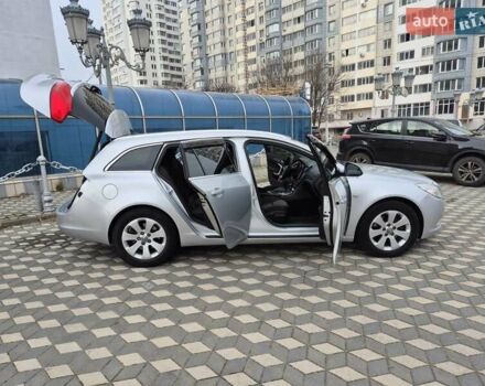 Серый Опель Инсигния, объемом двигателя 1.96 л и пробегом 238 тыс. км за 10700 $, фото 5 на Automoto.ua