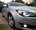 Серый Опель Инсигния, объемом двигателя 2 л и пробегом 220 тыс. км за 10100 $, фото 2 на Automoto.ua