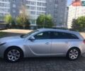 Сірий Опель Інсігнія, об'ємом двигуна 1.96 л та пробігом 150 тис. км за 10550 $, фото 1 на Automoto.ua