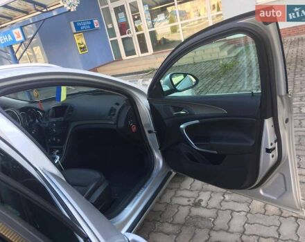 Серый Опель Инсигния, объемом двигателя 1.96 л и пробегом 150 тыс. км за 10550 $, фото 5 на Automoto.ua