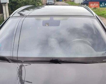 Серый Опель Инсигния, объемом двигателя 1.96 л и пробегом 214 тыс. км за 9200 $, фото 2 на Automoto.ua