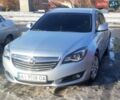 Серый Опель Инсигния, объемом двигателя 2 л и пробегом 220 тыс. км за 9600 $, фото 2 на Automoto.ua