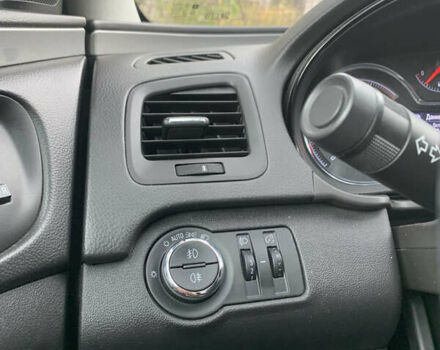 Серый Опель Инсигния, объемом двигателя 1.96 л и пробегом 239 тыс. км за 10000 $, фото 5 на Automoto.ua