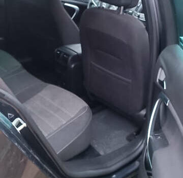 Серый Опель Инсигния, объемом двигателя 2 л и пробегом 235 тыс. км за 12200 $, фото 4 на Automoto.ua