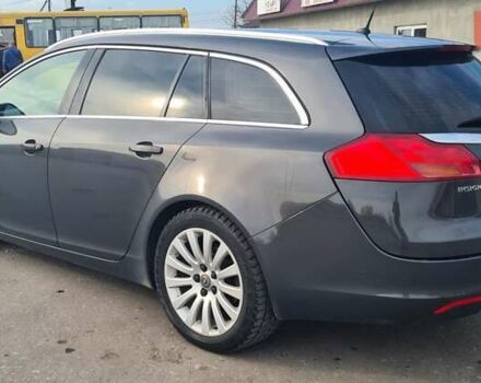 Сірий Опель Інсігнія, об'ємом двигуна 2 л та пробігом 225 тис. км за 8899 $, фото 1 на Automoto.ua