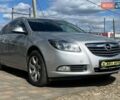 Серый Опель Инсигния, объемом двигателя 2 л и пробегом 245 тыс. км за 8500 $, фото 1 на Automoto.ua
