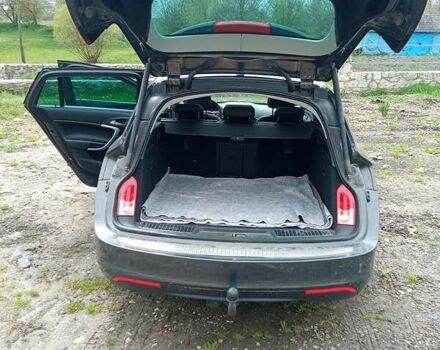 Серый Опель Инсигния, объемом двигателя 2 л и пробегом 240 тыс. км за 9500 $, фото 5 на Automoto.ua