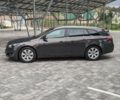 Серый Опель Инсигния, объемом двигателя 2 л и пробегом 285 тыс. км за 11699 $, фото 2 на Automoto.ua