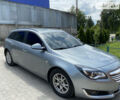 Серый Опель Инсигния, объемом двигателя 2 л и пробегом 211 тыс. км за 9500 $, фото 1 на Automoto.ua