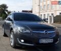 Серый Опель Инсигния, объемом двигателя 1.96 л и пробегом 300 тыс. км за 9500 $, фото 1 на Automoto.ua