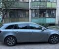 Серый Опель Инсигния, объемом двигателя 1.96 л и пробегом 370 тыс. км за 9500 $, фото 2 на Automoto.ua