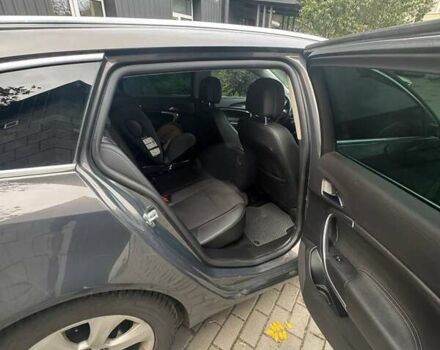 Серый Опель Инсигния, объемом двигателя 1.96 л и пробегом 205 тыс. км за 10700 $, фото 7 на Automoto.ua