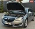 Серый Опель Инсигния, объемом двигателя 2 л и пробегом 235 тыс. км за 11000 $, фото 3 на Automoto.ua