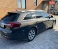 Серый Опель Инсигния, объемом двигателя 2 л и пробегом 207 тыс. км за 9700 $, фото 4 на Automoto.ua