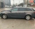 Серый Опель Инсигния, объемом двигателя 2 л и пробегом 323 тыс. км за 8500 $, фото 5 на Automoto.ua