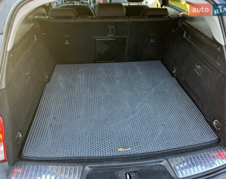 Серый Опель Инсигния, объемом двигателя 2 л и пробегом 248 тыс. км за 9750 $, фото 7 на Automoto.ua