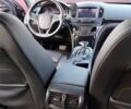 Серый Опель Инсигния, объемом двигателя 1.96 л и пробегом 287 тыс. км за 12000 $, фото 1 на Automoto.ua