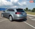 Сірий Опель Інсігнія, об'ємом двигуна 1.96 л та пробігом 220 тис. км за 10550 $, фото 4 на Automoto.ua