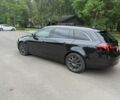 Сірий Опель Інсігнія, об'ємом двигуна 2 л та пробігом 260 тис. км за 9800 $, фото 1 на Automoto.ua