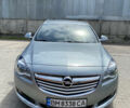 Серый Опель Инсигния, объемом двигателя 2 л и пробегом 211 тыс. км за 9500 $, фото 1 на Automoto.ua