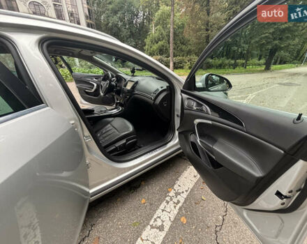 Сірий Опель Інсігнія, об'ємом двигуна 1.96 л та пробігом 253 тис. км за 10999 $, фото 16 на Automoto.ua