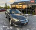 Серый Опель Инсигния, объемом двигателя 2 л и пробегом 295 тыс. км за 8999 $, фото 1 на Automoto.ua